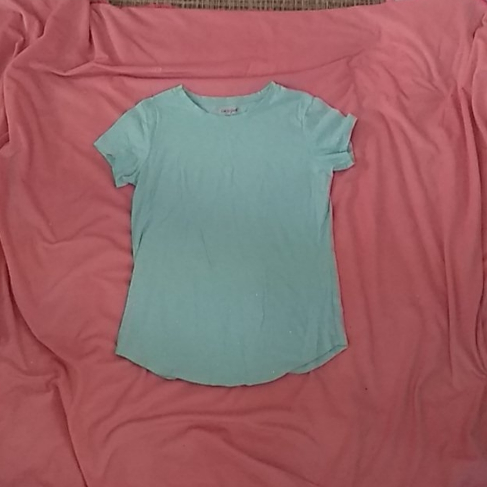 A shirt with glitter on it